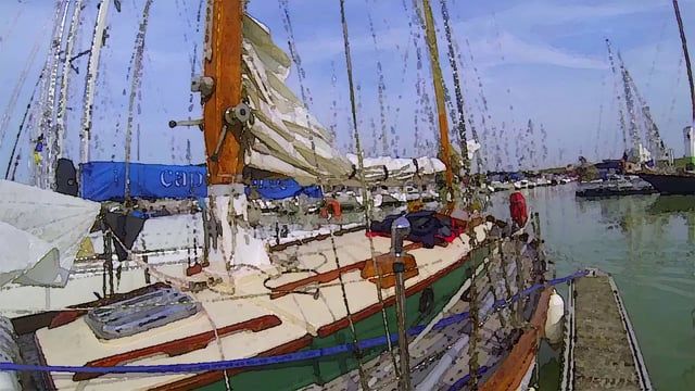 Delivering a vintage wooden boat along the coast into Belgium