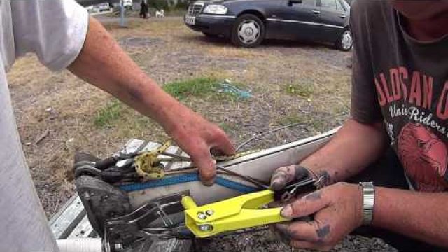 Inspecting the Mast and fitting radio Antenna to dons yacht